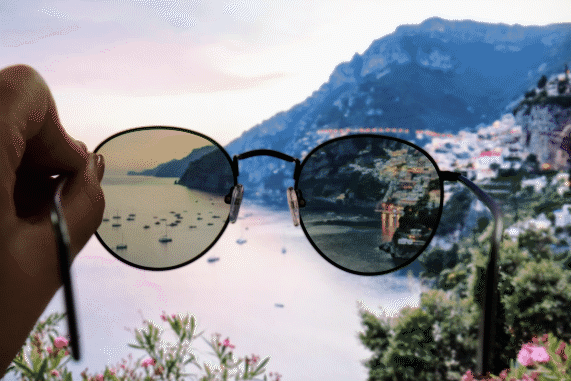 moving image of polarised sunglasses rotating and darkening background