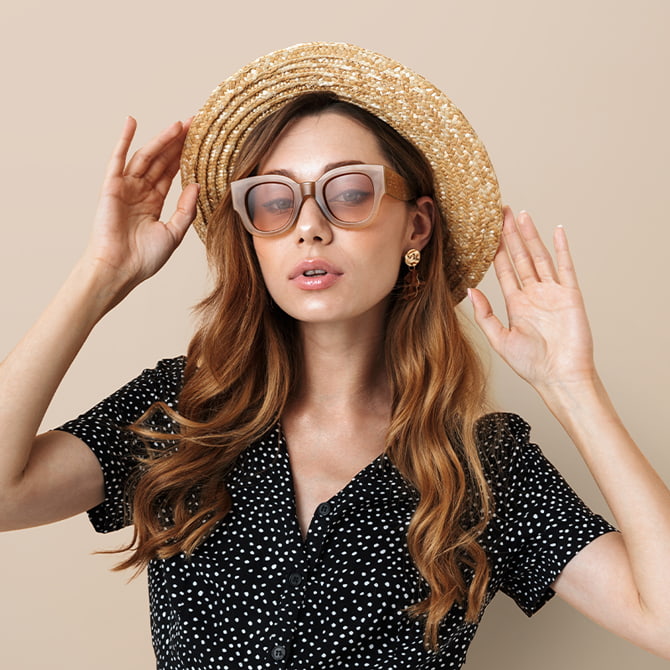 Young lady with large retro sunglasses